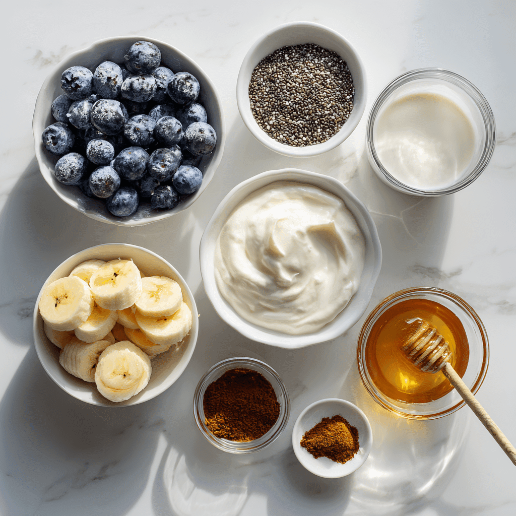 Blueberry Chia Seed Smoothie – A Simple, Nourishing Way to Start Your Day 7 Ingredients for blueberry chia seed smoothie arranged flat lay